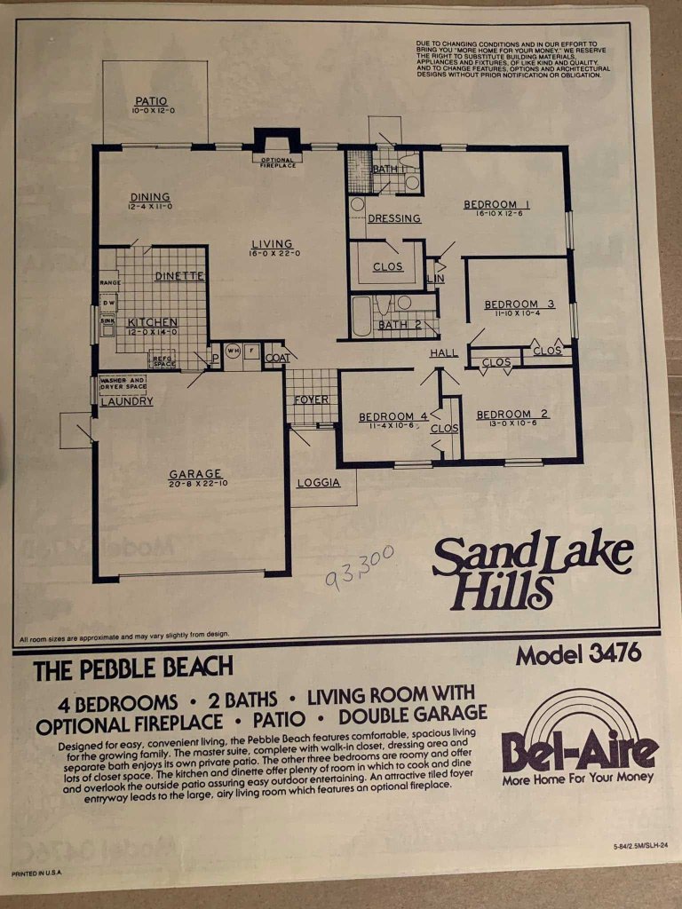 Floor plan of 'The Pebble Beach' model located in Sand Lake Hills, featuring 4 bedrooms, 2 baths, a living room, dining area, kitchen, laundry, and a double garage.